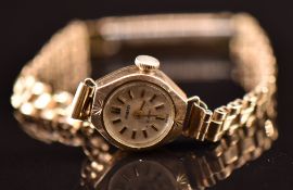 Regency 9ct gold ladies wristwatch with gold hands, two-tone hour markers, silver dial and 17