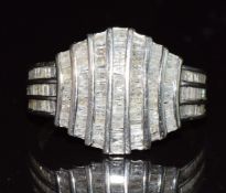 A 9ct white gold ring set with baguette cut diamonds, 3.3g, size P