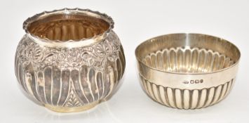 Two hallmarked silver bowls, one Victorian with embossed floral decoration, Birmingham 1890, maker's