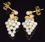 A pair of 9ct gold earrings set with pearls in the form of a bunch of grapes, 3.8g, 2.5g