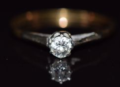 An 18ct gold ring set with a diamond of approximately 0.2ct in a platinum setting, in vintage box,