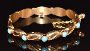 A 14k gold bangle set with faux turquoise, 9.4g, diameter 4.7cm