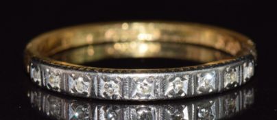 An 18ct gold half eternity ring set with diamonds, 2.1g, size M