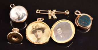 Victorian yellow metal globe locket, a 15ct gold locket (6.1g), 9ct gold swivel fob, 9ct gold stud