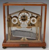 Congreve novelty rolling ball clock with name plate to front of base F.G. Rowsell 23-3-89, overall