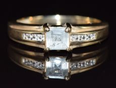 A 9ct gold ring set with a square cut heliodor, 3g, size N