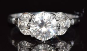 Art Deco platinum ring set with a diamond of approximately 1.5ct with diamond encrusted shoulders,