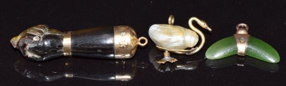 Victorian pendant/ charm in the form of a swan with a pearl set as the body, a nephrite jade pendant