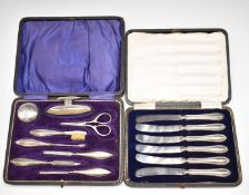 Cased hallmarked silver mounted manicure set, width of case 21.5cm, together with a cased set of