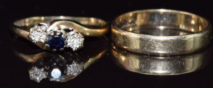 A 9ct gold wedding band / ring and a 9ct gold ring set with a sapphire and diamonds, 3.4g, size L