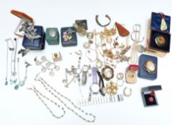 A collection of costume jewellery including two pinchbeck brooches set with cameos, silver charm