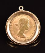 Elizabeth II 1966 gold full sovereign in 9ct gold mount, 10.5g