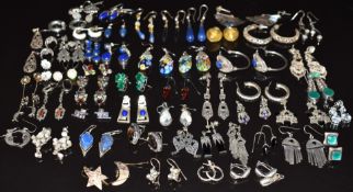 Fifty pairs of silver earrings including abalone, lapis lazuli, mother of pearl, etc