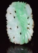 A 9ct gold ring set with a carved jade plaque, 8g, size I