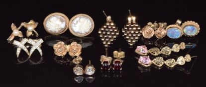 Ten pairs of 9ct gold earrings set with cubic zirconia, opal triplets, cameos, pearls, etc, 15g