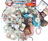 A collection of beaded necklaces and bracelets including sunstone, quartz, glass, etc