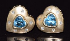 A pair of 9ct gold earrings set with heart shaped topaz and diamonds, 2.3g