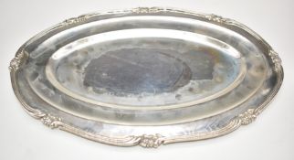 Peruvian silver oval platter or tray with shaped floral border, marked N.D. Peruana Plata 925,