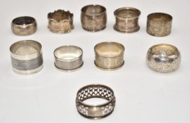 Ten various hallmarked silver napkin rings, weight 194g