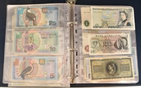 British and world banknote album containing Serbia Dinara 1941-1942, Bank of England £5 Series E