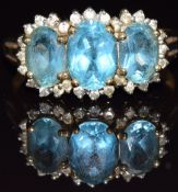 A 9ct gold ring set with topaz and diamonds, 3.5g, size T