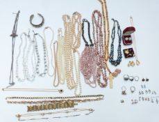A collection of jewellery including Toledo bracelet, and necklaces including pearl, bone, Art Deco