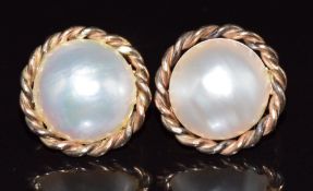 A pair of 9ct gold earrings set with mabe pearls, 8.2g