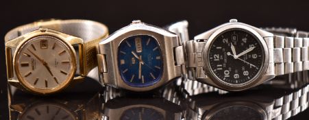 Three Seiko gentleman's wristwatches, two automatic ref. 6319-5010 and 7005-8022 and one military