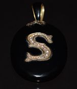 Victorian jet pendant/ locket set with seed pearls in a letter S , verso a glass compartment, 25g,