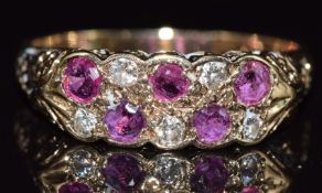 A 9ct gold ring set with rubies and diamonds, 3g, size O