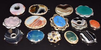 A collection of mainly Victorian agate brooches including banded agate, carnelian agate with