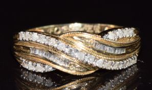 A 14k gold ring set with baguette and round cut diamonds, 3g, size N