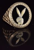 A 9ct gold ring set with a bunny plaque, 4.2g, size O