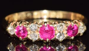 An 18ct gold ring set with rubies and diamonds, Birmingham 1912, 2.6g, size N