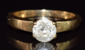 An 18ct gold ring set with a round brilliant cut diamond of approximately 1ct, 5.1g, size N