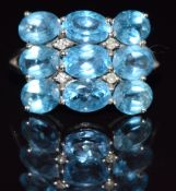A 9ct white gold ring set with topaz and diamonds, 4.8g, size S
