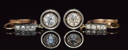 A pair of Victorian drop earrings, each set with an old cut diamond of approximately 0.65ct, with