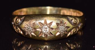 Edwardian 18ct gold ring set with three diamonds in a star setting, Birmingham 1911, 3.8g, size U