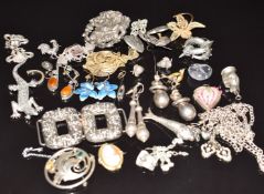 A silver seal in the form of a bear, Birmingham 1908, white metal Thai buckle, heart shaped silver