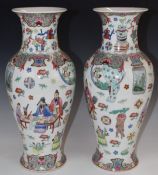 Pair of 20thC Chinese vases of baluster form decorated with figural scenes, flowers and foliage,