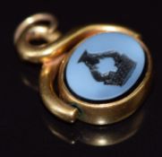 Victorian swivel fob set with a bloodstone intaglio and agate intaglio depicting a heraldic symbol