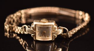 Omega ladies wristwatch ref. C3941 with gold hands and diamond hour markers, silver dial, gold