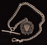 A silver Albert / watch chain with silver fob, 43.2g, 32cm long