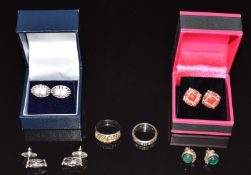 A 9ct gold and silver eternity ring, a silver ring and four pairs of silver earrings