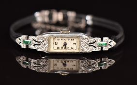 Bulgari Art Deco platinum ladies wristwatch set with diamonds and emeralds to the case, blued hands,