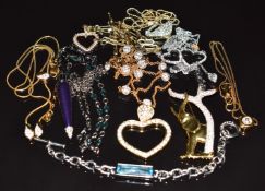 Four Swarovski necklaces/ pendants, brooch and bracelet
