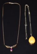 A 9ct gold necklace set with a ruby and diamond (3.5g) and an 875 silver Russian chain and pendant
