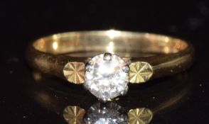 An 18ct gold ring set with a round cut diamond of approximately 0.3ct, 3.1g, size M