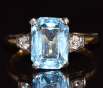 Art Deco 18ct gold ring set with an emerald cut aquamarine of approximately 2.5ct and two diamonds
