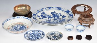 19thC Chinese pedestal dish, Japanese charger, hardwood stands etc, diameter of largest 35cm